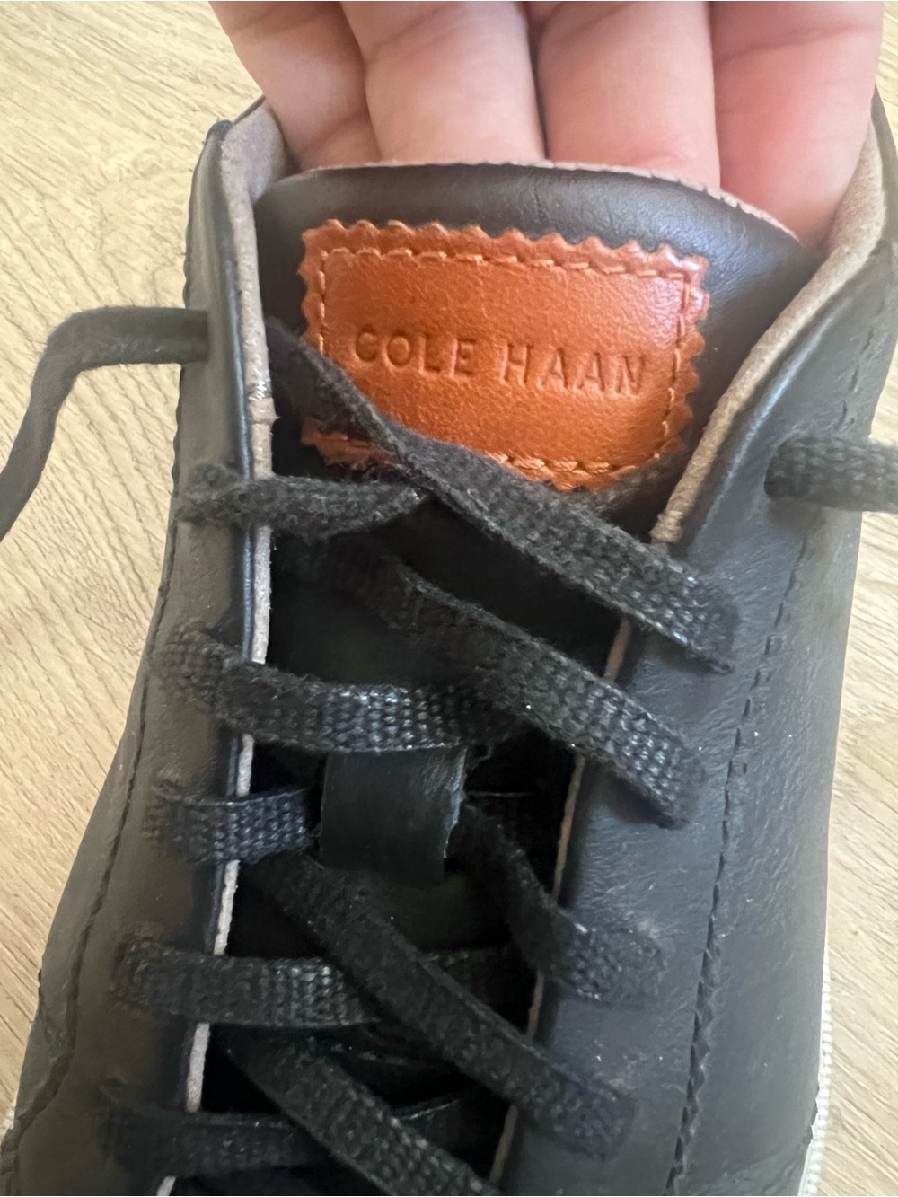 Cole Haan Black Leather Sneaker with Tan Logo Patch